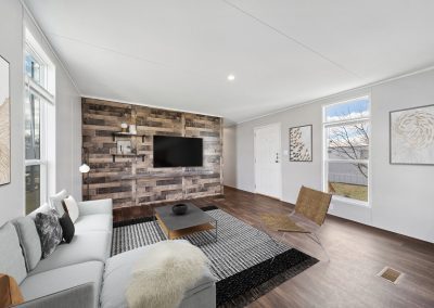 Model living room with view of entry way at Cedar Ridge Manufactured Homes in Wichita Kansas