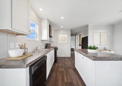 Model kitchen with island at Cedar Ridge Manufactured Homes in Wichita Kansas