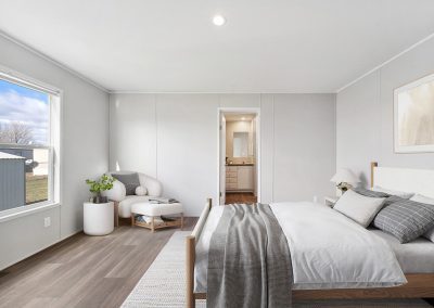Model bedroom with attached bathroom at Cedar Ridge Manufactured Homes in Wichita Kansas