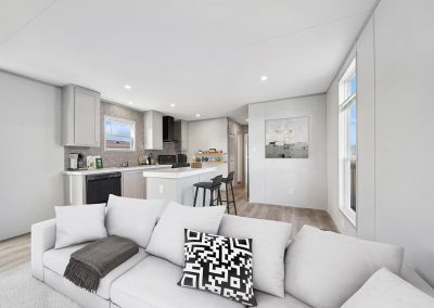 Model open living room and kitchen at Cedar Ridge Manufactured Homes in Wichita Kansas