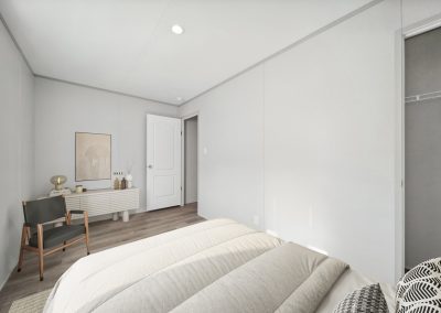 Model bedroom with closet at Cedar Ridge Manufactured Homes in Wichita Kansas