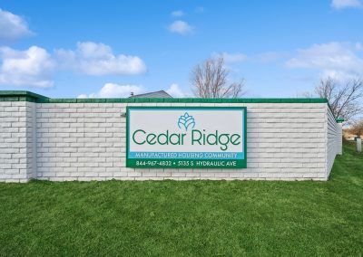 Community sign at entry at Cedar Ridge Manufactured Homes in Wichita, Kansas
